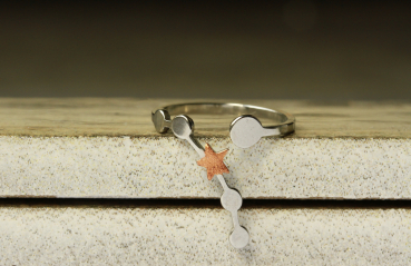 Edelstahl Himmelskörper Ring als Morning Star Statementring und himmlisches Geschenk für sie mit Planetenkonstellation und Kupfer Stern