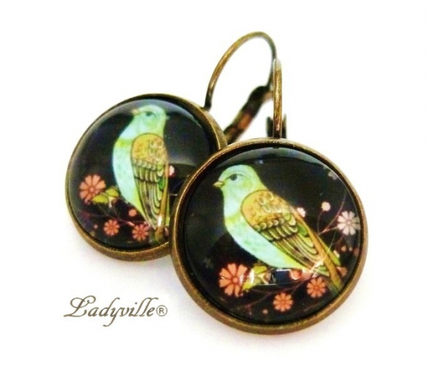 Große Ohrringe - Paradiesvogel auf feiner Blüte