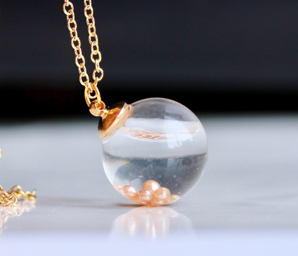 Terrarium Kette Perlen im Wasser